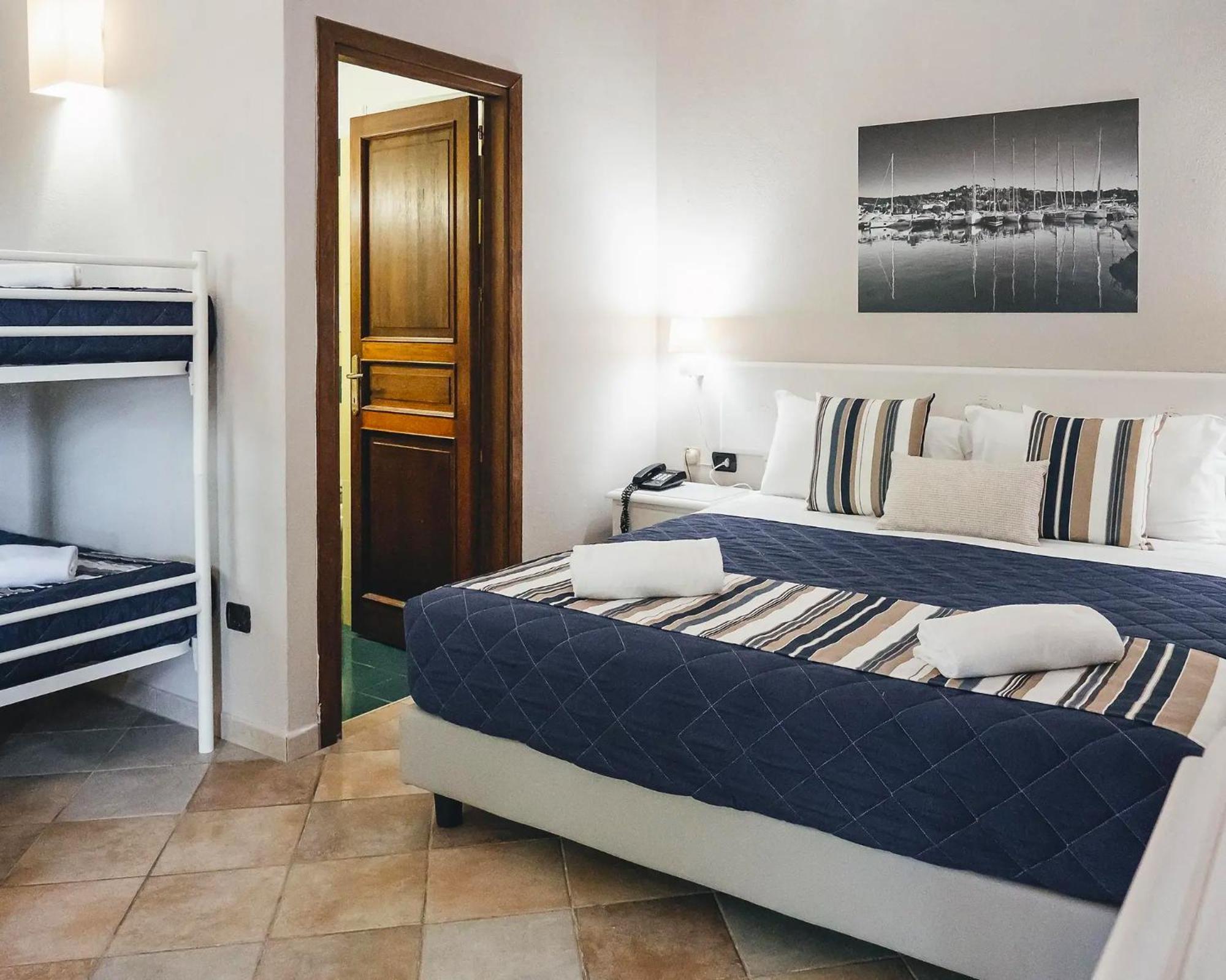 Готель Zeta Club San Teodoro Le Rose Екстер'єр фото