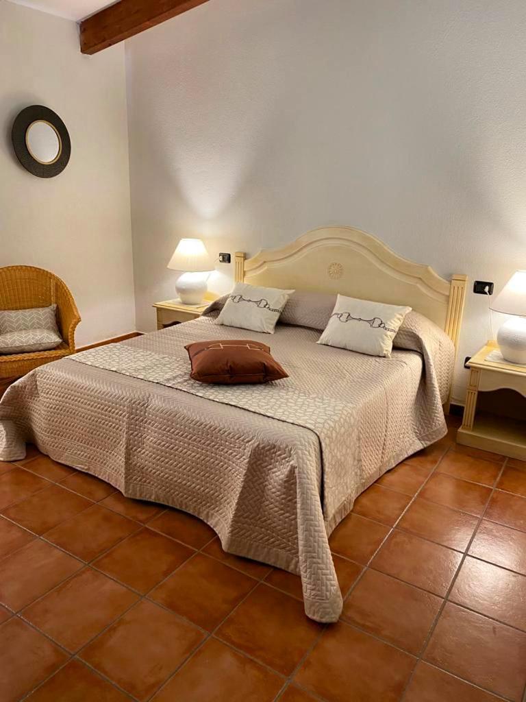 Готель Zeta Club San Teodoro Le Rose Екстер'єр фото